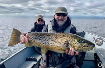 Ton up! Tomi nets ferox no. 100 on Corrib