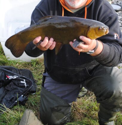Neil is all smiles with his Tench
