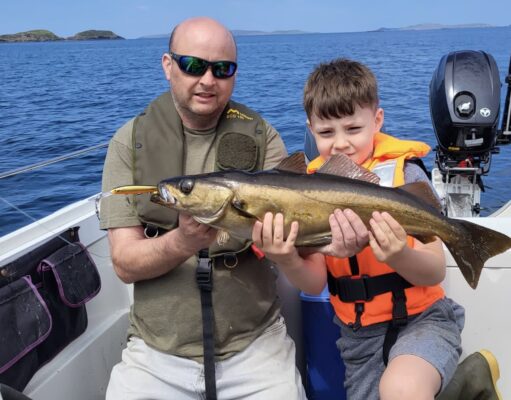 8 year old Rory enjoys Clifden’s pollack pollack
