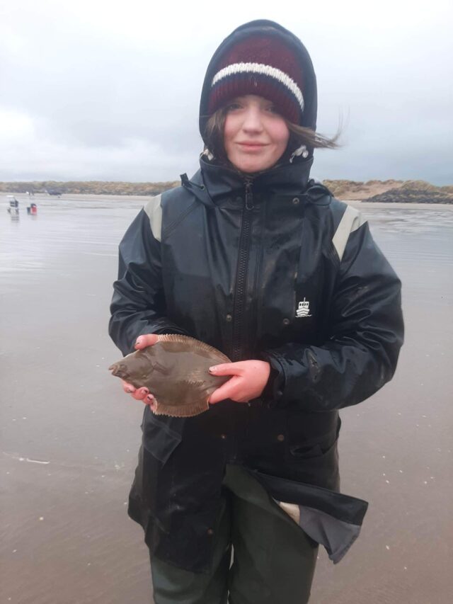 Winning junior angler Aisling McGettigan with a flounder