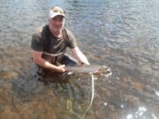 Warm weather and low water conditions make fishing difficult on the Moy Garrett Ruigrok releasing a 7 lbs salmon caught on 5th June at the Ridge Pool