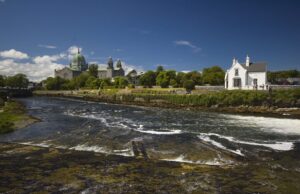 Grilse run underway in Galway before heatwave Water on a weir