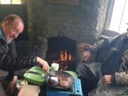 Ceri Jones talks trout with Colin Dodd on Lough Arrow making lunch