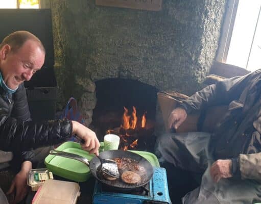 Ceri Jones talks trout with Colin Dodd on Lough Arrow making lunch