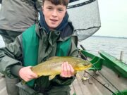 Cousins catching on Lough Owel Seamus McGuinness with his Owel trout