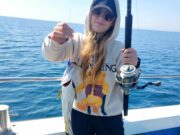 Busy anglers on the Karen Ann getting a few different species
