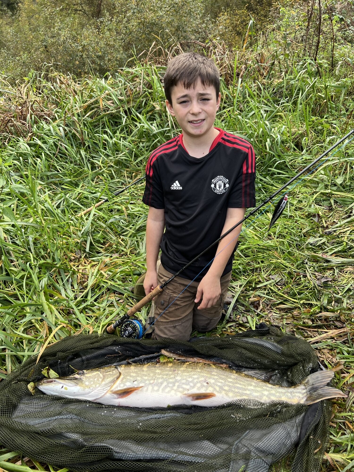 Anthony with pike on the fly 