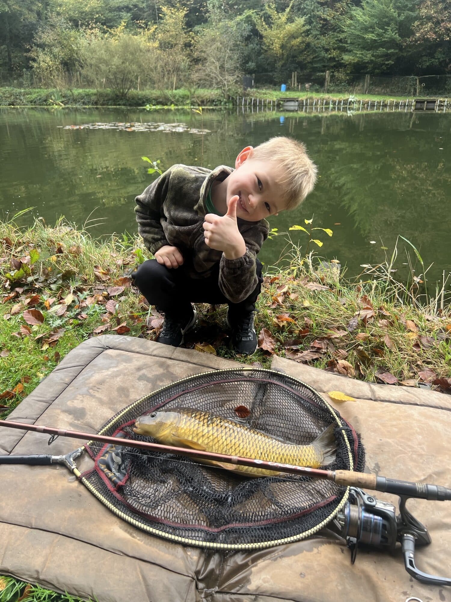 Daniel with a carp (my youngest apprentice)