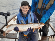 Young Lorcan puts Santa’s present to great use on Lough Erne