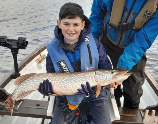 Young Lorcan puts Santa’s present to great use on Lough Erne