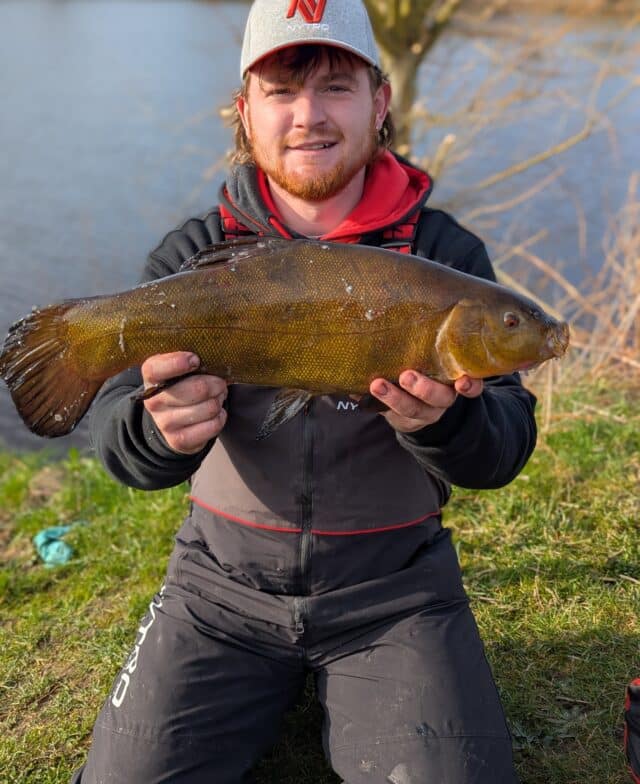 Dean Murray with a March tench of nearly 6lb
