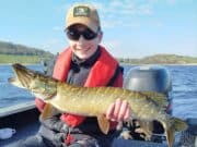 PB pike for young angler fishing with Anglers Paradise