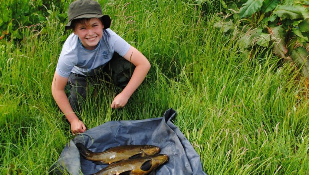 First ever Tench for 11 year old Leo is the reason he is all smiles with these lovely specimens.