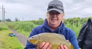 Paula with a tench