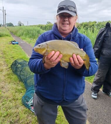 Paula with a tench