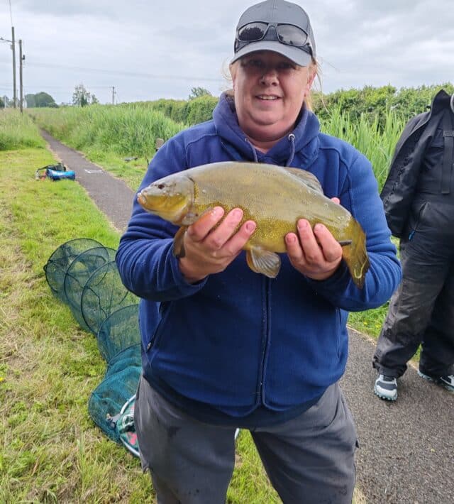 Paula with a tench