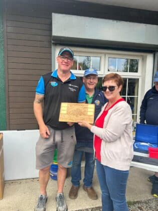 Adrian Browne the first winner of the John Kearney memorial been presented By Theresa Kearney and Michael Kearney .