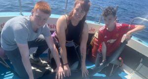 Exhausted anglers stop at shark number 23 as 10 circle the boat Sinead,sean,liam with a shark