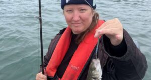 Daisy Swette with a bass