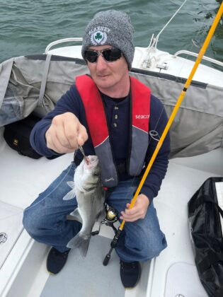 Joseph Swette with a bass