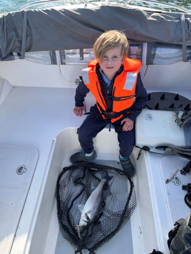Eoin Flood, first cast nets a bass!