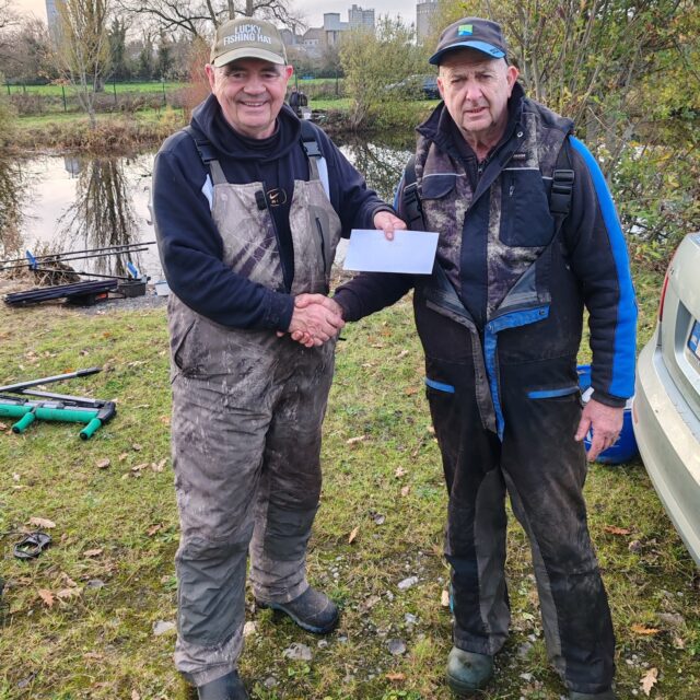 Tommy Cahill presented with his prize