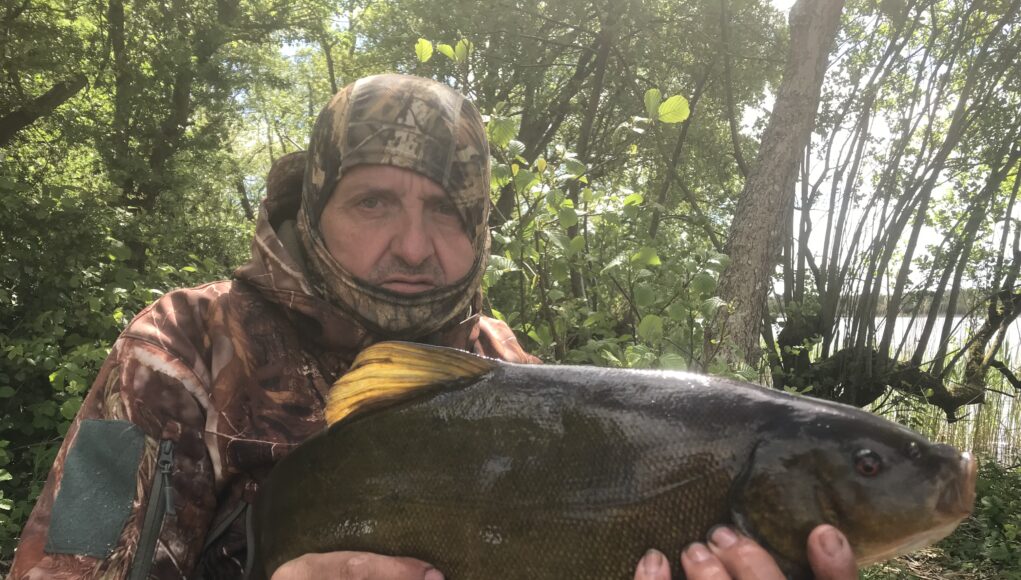Paul with his best Tench of the trip 5lb 7oz