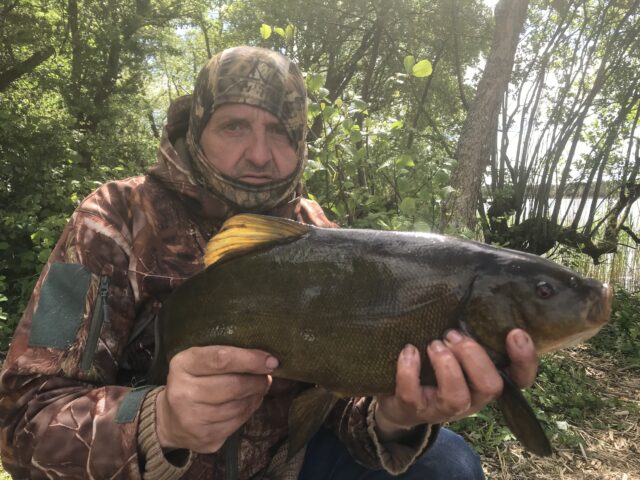 Paul with his best Tench of the trip 5lb 7oz