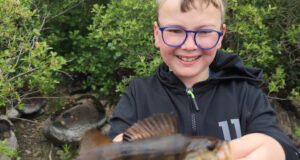 Spinning for perch on Melvin’s shores Adam with a Perch from Lough Melvin